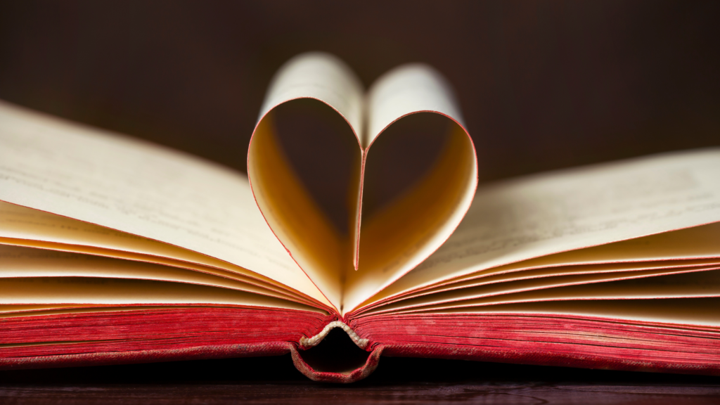 Image of a book with pages folded into a heart